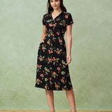 Glória - Vestido Midi Negro con Estampado Floral