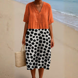 Penélope - Vestido Naranja con Motivos en Contraste