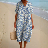Magnolia - Vestido de Marfil con Detalles Florales en Azul Porcelana