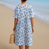 Magnolia - Vestido de Marfil Decorado con Detalles Florales en Azul Porcelana
