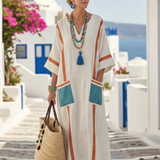 Noemi | Vestido maxi de escote en V, manga corta y con bolsillos