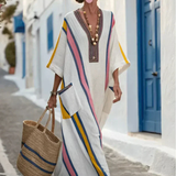 Noemi | Vestido maxi de escote en V, manga corta y con bolsillos